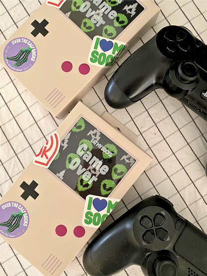 EAT MY SOCKS Geschenksocken „Game Over“